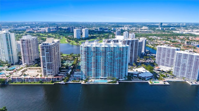 bird's eye view with a view of city and a water view