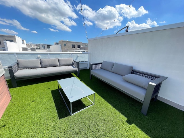 6651 NW 105th Pl Unit 6651, Doral, FL 33178 - view of grassy yard featuring an outdoor living space and a balcony