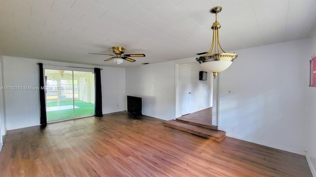 260 Fraser Ave, La Belle, FL 33935 - unfurnished living room with ceiling fan and wood finished floors