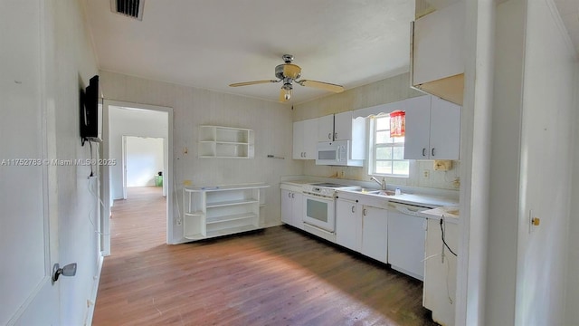 260 Fraser Ave, La Belle, FL 33935 - kitchen featuring white appliances, visible vents, light countertops, white cabinetry, and a sink