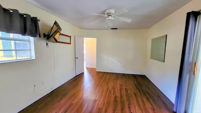 260 Fraser Ave, La Belle, FL 33935 - unfurnished room featuring a ceiling fan, visible vents, and dark wood-style flooring