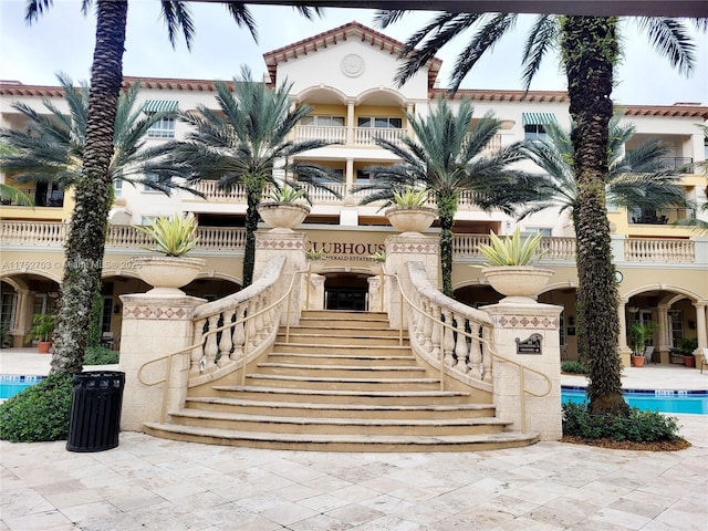 view of property with stairway