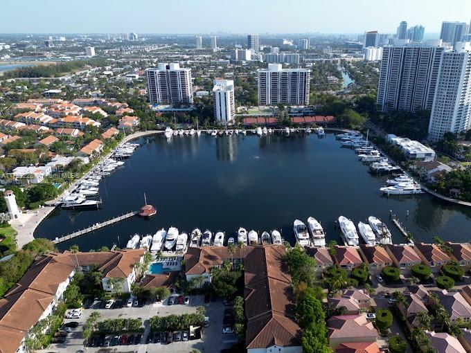 aerial view with a water view and a city view