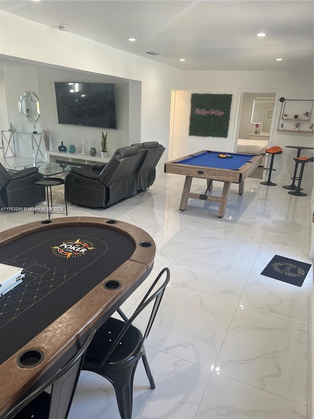 game room featuring recessed lighting, marble finish floor, and pool table