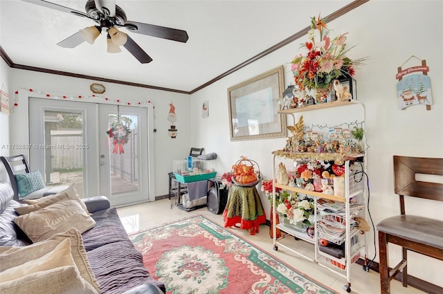 game room with ceiling fan, baseboards, crown molding, and french doors