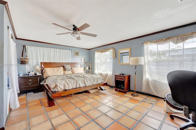 bedroom with ornamental molding and a ceiling fan