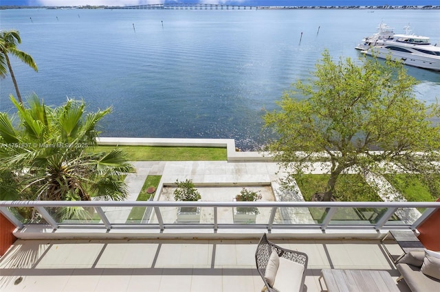 exterior space with a water view