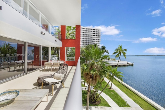 balcony featuring a water view