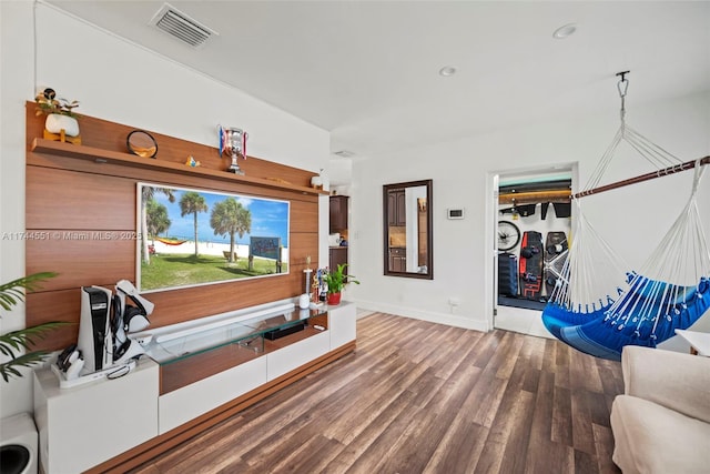 5801 NE 3rd Ave, Oakland Park, FL 33334 - living area with baseboards, visible vents, wood finished floors, and recessed lighting