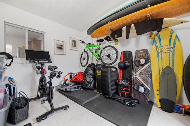 5801 NE 3rd Ave, Oakland Park, FL 33334 - exercise area featuring light tile patterned floors