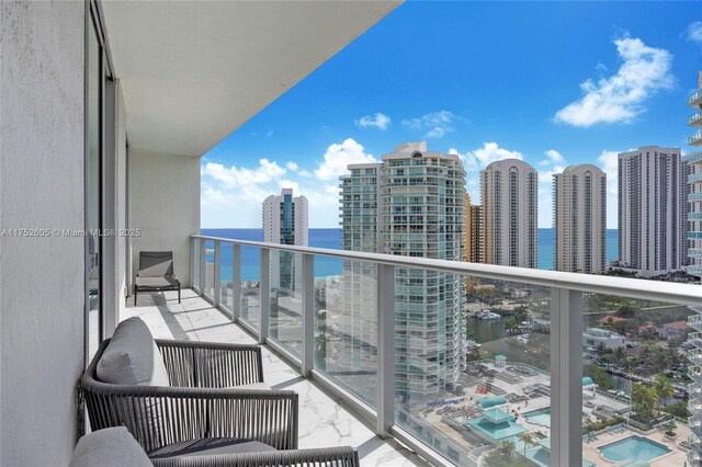 balcony featuring a view of city