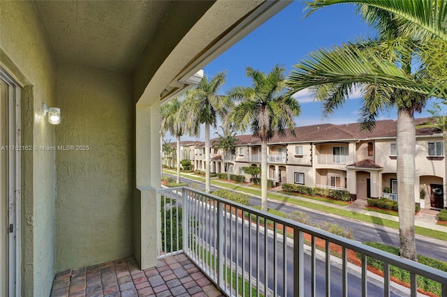 balcony featuring a residential view