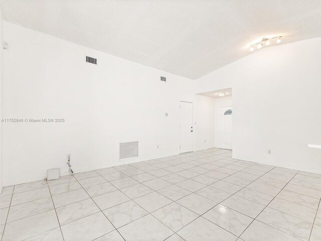 12344 SW 144th Ter, Miami, FL 33186 - unfurnished room with lofted ceiling