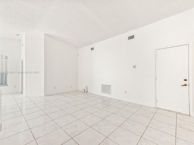 12344 SW 144th Ter, Miami, FL 33186 - unfurnished room with a textured ceiling