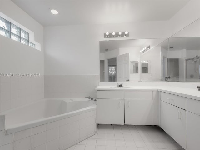 12344 SW 144th Ter, Miami, FL 33186 - full bathroom featuring vanity, a garden tub, and tile patterned floors
