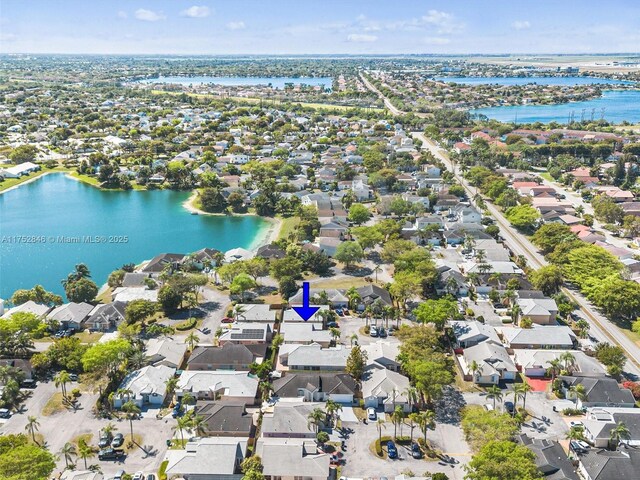 12344 SW 144th Ter, Miami, FL 33186 - aerial overview of property's location with nearby suburban area and a nearby body of water