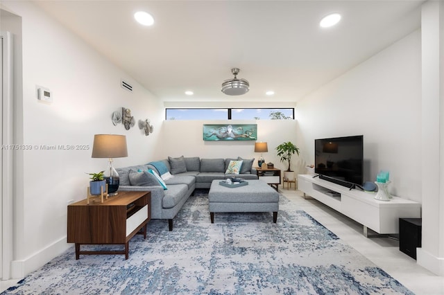 living room featuring recessed lighting