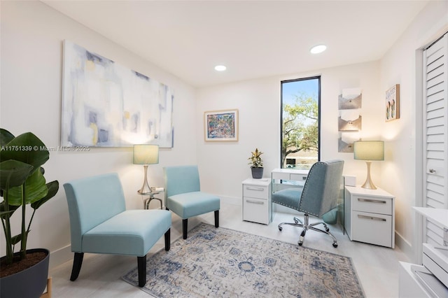 office featuring baseboards and recessed lighting