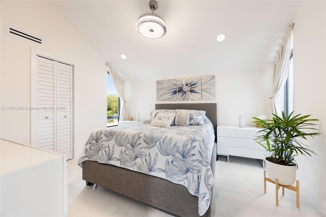 bedroom with vaulted ceiling, visible vents, and recessed lighting