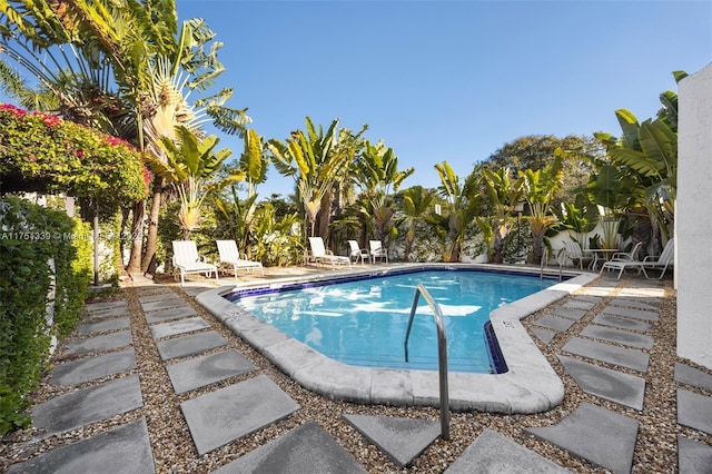 community pool with a patio