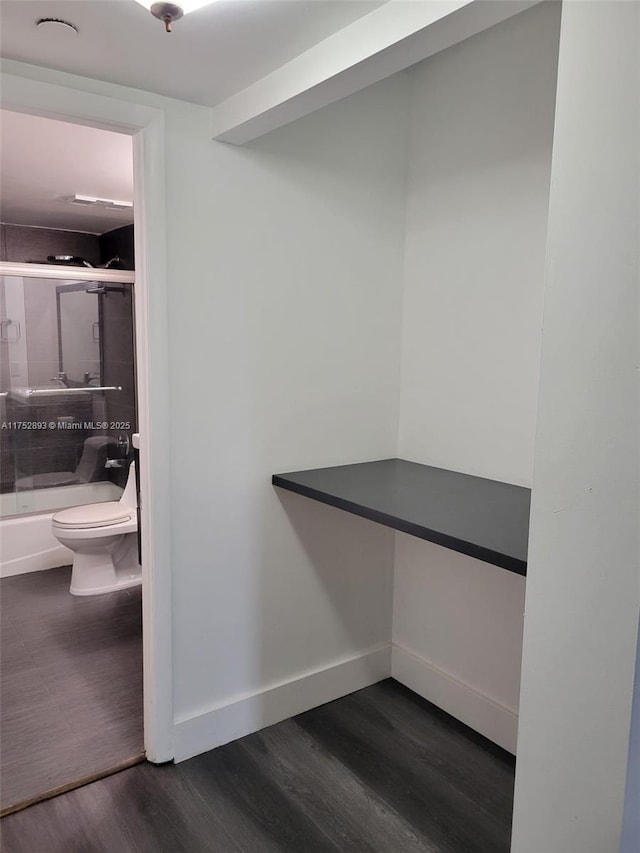 1470 NE 123rd St Unit A204, North Miami, FL 33161 - spacious closet featuring dark wood-type flooring