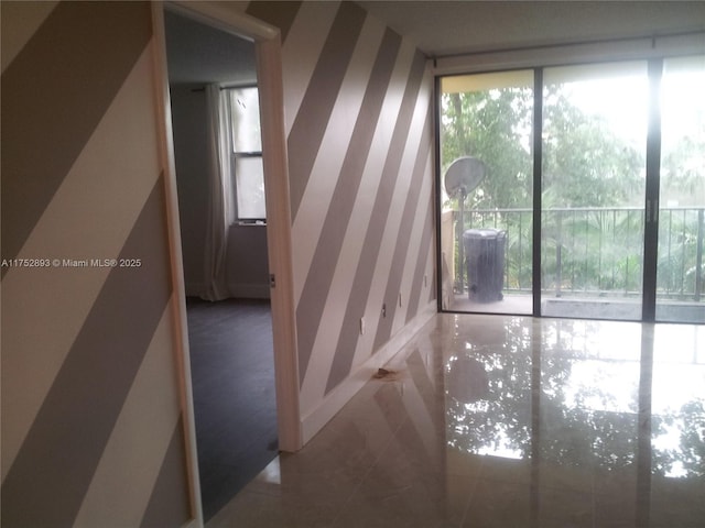 1470 NE 123rd St Unit A204, North Miami, FL 33161 - stairs featuring wallpapered walls and tile patterned flooring