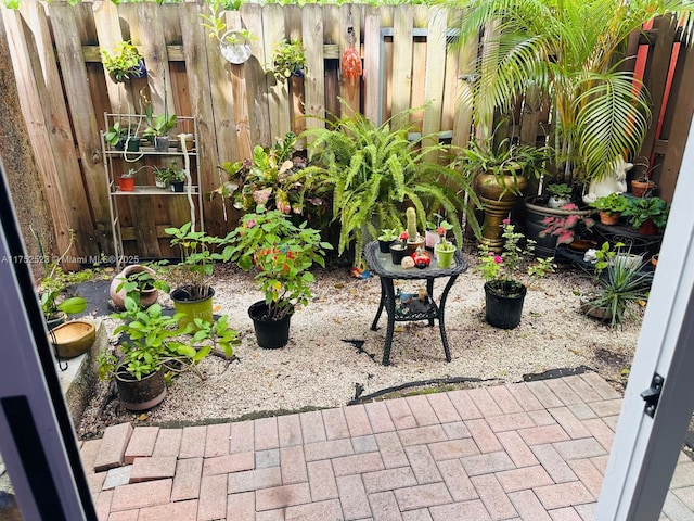 1550 NE 33rd Ave Unit 107-8, Homestead, FL 33033 - view of yard with fence