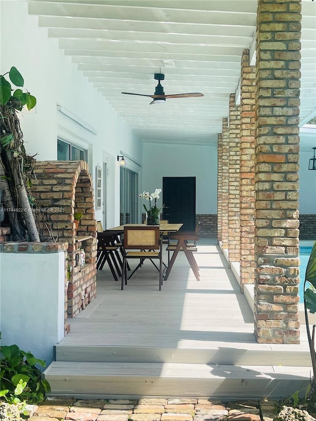 exterior space featuring ceiling fan and outdoor dining space