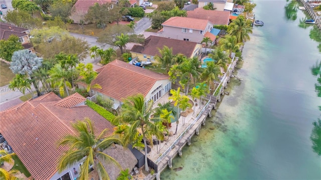 birds eye view of property featuring a residential view and a water view