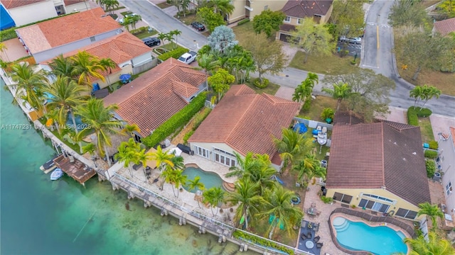 aerial view featuring a water view and a residential view