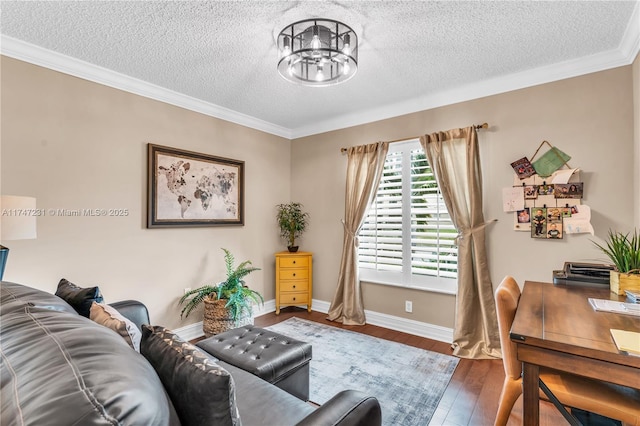 living room featuring a chandelier, a textured ceiling, wood-type flooring, and baseboards