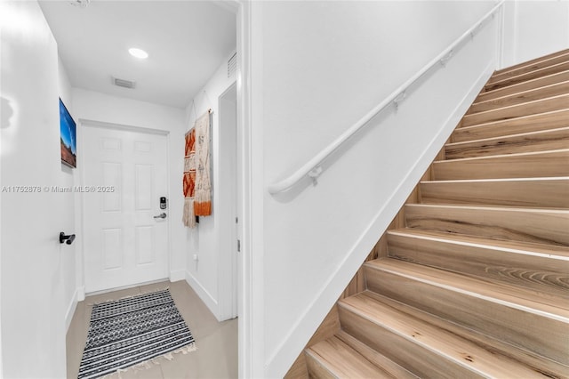 interior space featuring recessed lighting and visible vents