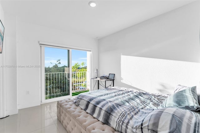 bedroom with access to exterior, baseboards, and light tile patterned floors