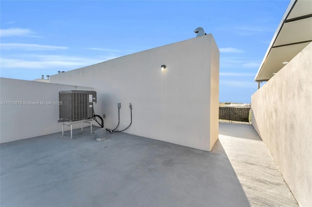 view of patio with central AC