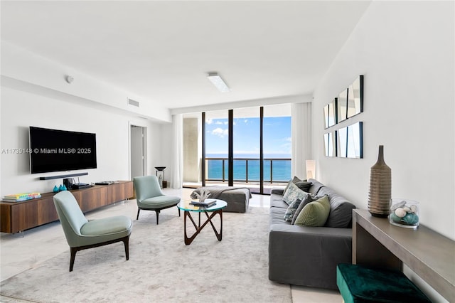 16275 Collins Ave Unit 1501, Sunny Isles Beach, FL 33160 - living area featuring visible vents, a water view, marble finish floor, and floor to ceiling windows