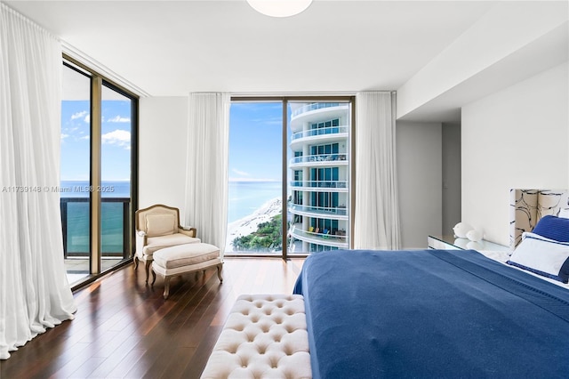 16275 Collins Ave Unit 1501, Sunny Isles Beach, FL 33160 - bedroom with access to outside, floor to ceiling windows, and wood finished floors