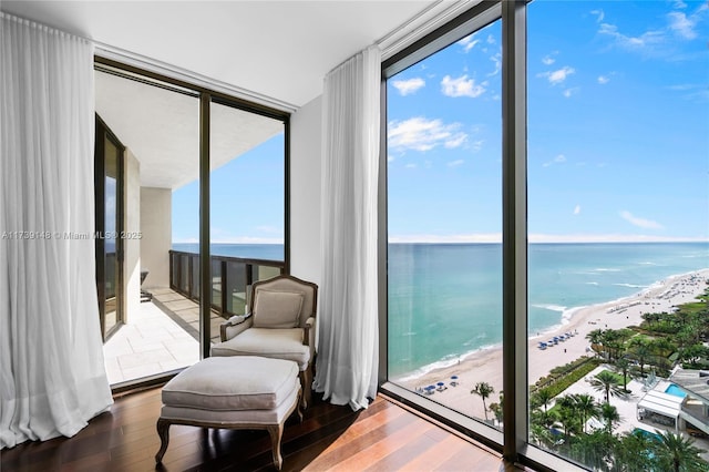 16275 Collins Ave Unit 1501, Sunny Isles Beach, FL 33160 - sunroom with a water view and a beach view
