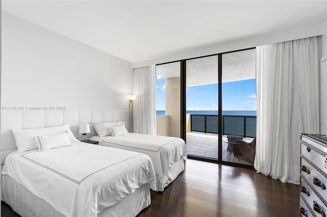 16275 Collins Ave Unit 1501, Sunny Isles Beach, FL 33160 - bedroom with access to exterior, a water view, and dark wood-style flooring