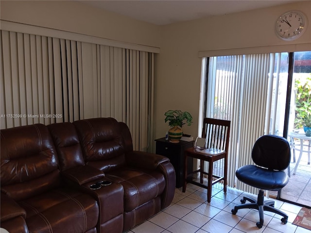 living area with light tile patterned floors