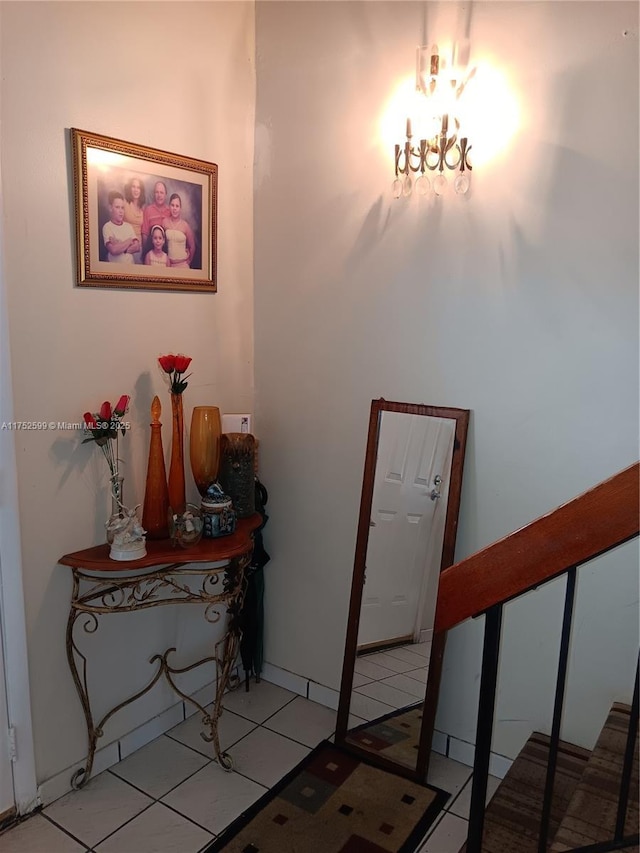 foyer featuring light tile patterned flooring