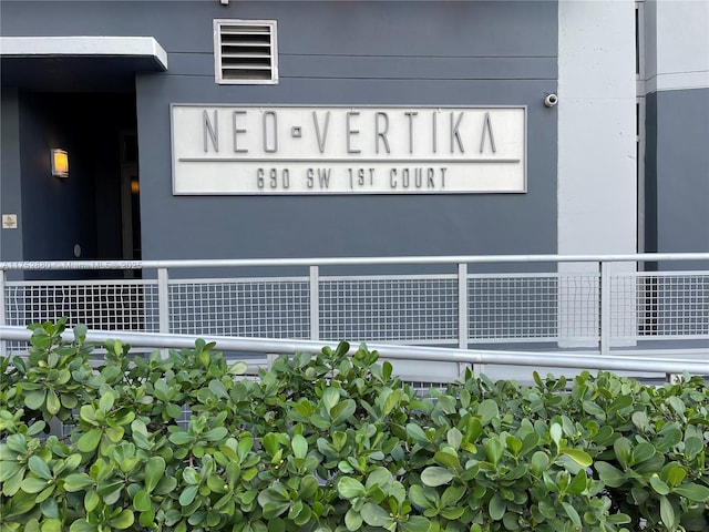 exterior space featuring visible vents and stucco siding