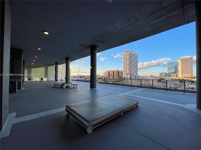 view of patio / terrace featuring a city view