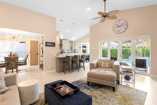 living area with recessed lighting, french doors, high vaulted ceiling, a notable chandelier, and light tile patterned flooring