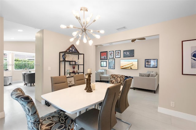 dining room featuring a notable chandelier, light tile patterned floors, recessed lighting, visible vents, and baseboards