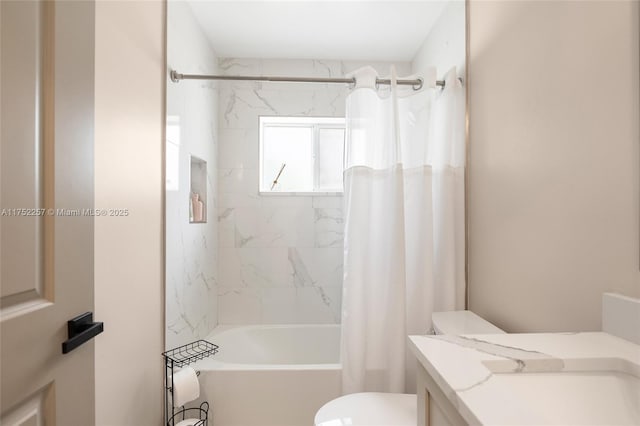 bathroom featuring shower / bath combination with curtain, vanity, and toilet