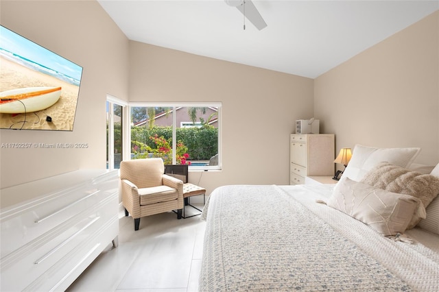 bedroom featuring vaulted ceiling and a ceiling fan