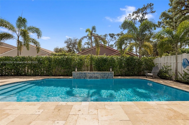 view of swimming pool featuring a fenced backyard and a fenced in pool