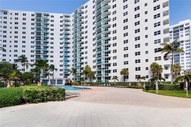 view of property featuring a community pool