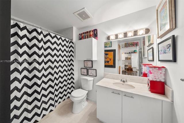 bathroom with visible vents, toilet, curtained shower, tile patterned flooring, and vanity