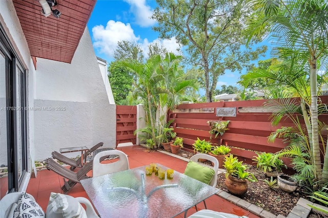 balcony featuring a patio and outdoor dining space